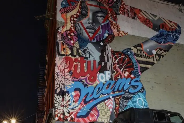 Mural by Tristan Eaton reads Big City Of Dreams.